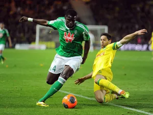 Kurt Zouma Kicking Orange Ball Wallpaper