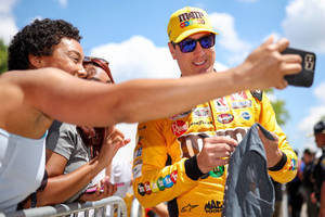 Kyle Busch With Fans Wallpaper