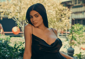 Kylie Jenner In Silk Black Dress Wallpaper