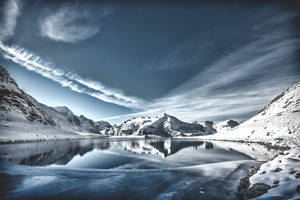 Lake Reflects Mountain In Cool Winter Wallpaper
