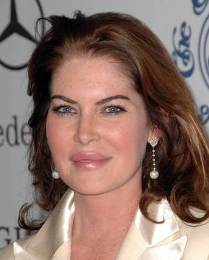 Lara Flynn Boyle At Carousel Of Hope Ball Wallpaper