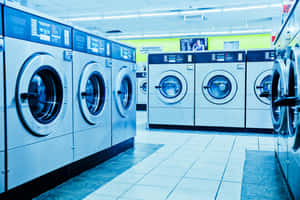 Laundromat Rowof Washing Machines Wallpaper