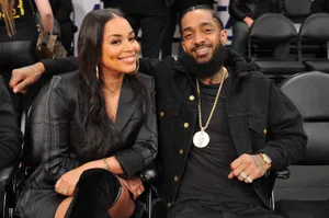 Lauren London Poses Confidently In A Stylish Outfit. Wallpaper
