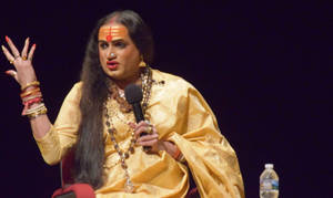 Laxmi Narayan Tripathi With Microphone Wallpaper