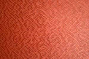 Leather Texture Bright Orange Wallpaper