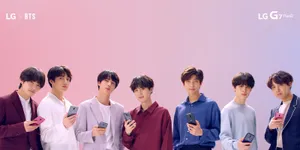 Lg G5 Ad Featuring A Group Of Young Men Wallpaper
