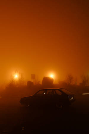 Light Brown Sunset Car On Road Wallpaper