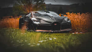 Light Up The Street In Style With A Neon Bugatti Wallpaper