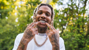 Lil Durk Showing His Teeth Wallpaper