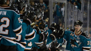 Logan Couture, Professional Ice Hockey Player, Celebrating A Great Play With A Fist Bump To His Teammates. Wallpaper