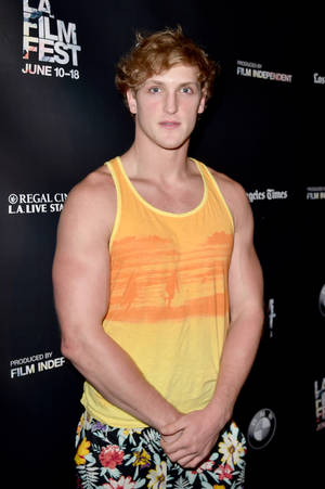 Logan Paul On Yellow Tank Top Wallpaper