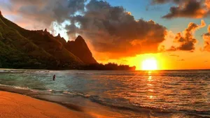 Lone Person On Malibu Beach Wallpaper