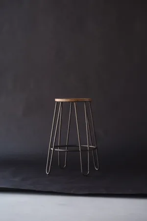 Lonely Wooden Stool With Black Background Wallpaper