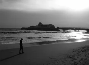 Loner In Beach Black And White Wallpaper