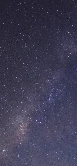 Look Out Into The Depths Of Space To Admire The Beauty Of The Galaxy And Its Many Stars. Wallpaper