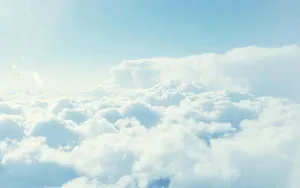 Looking Up To The Clouds For A Moment Of Peace Wallpaper
