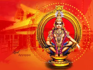 Lord Ayyappa On Temple Tinted With Orange Wallpaper