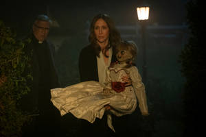 Lorraine Warren And Annabelle Doll Wallpaper