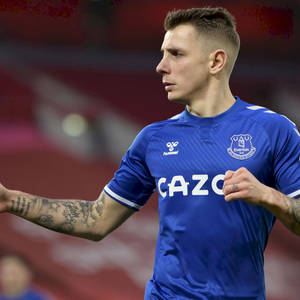 Lucas Digne Blue Jersey Side View Wallpaper