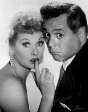 Lucille Ball And Desi Arnaz Playful Photo Wallpaper