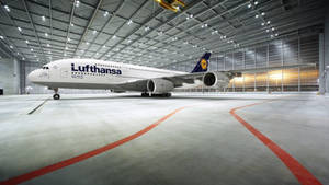 Lufthansa Plane Within A Hangar Wallpaper