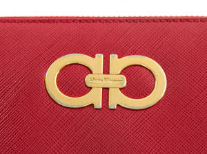 Luxurious Golden Salvatore Ferragamo Emblem Wallpaper