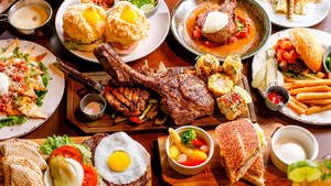 Luxurious Tomahawk Steak Lunch Buffet Wallpaper