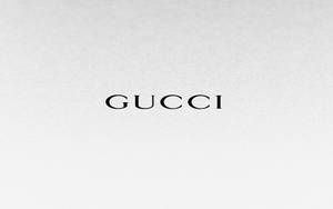 Luxury Defined - Exquisite Gucci Emblem In 4k Resolution Wallpaper