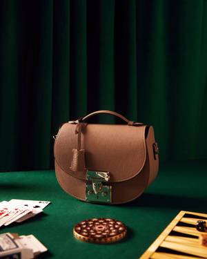 Luxury Leather Goods Crafted By Moynat Since 1849 Wallpaper