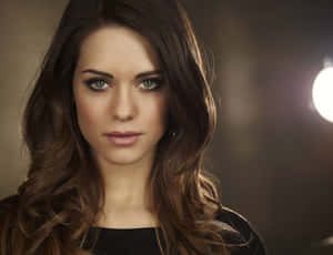 Lyndsy Fonseca Posing For A Stunning Portrait Wallpaper