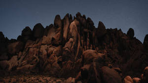 Macos Mojave Dark Desert Boulders Wallpaper
