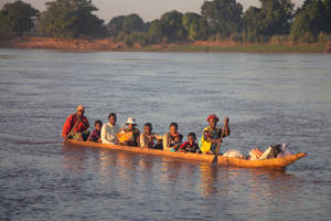 Madagascar People Riding Kayak Wallpaper