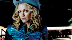 Madonna In Cowgirl Outfit Wallpaper