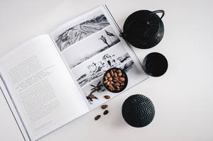 Magazine And Black Ceramics Wallpaper