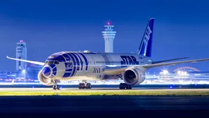 Magnificent Ana Airplane At Night Wallpaper
