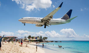 Maho Beach In Sint Maarten Wallpaper