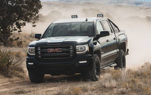 Majestic Gmc Sierra Cruising The Highway. Wallpaper