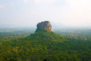 Majestic Sigiriya Rock Formation In Sri Lanka Wallpaper