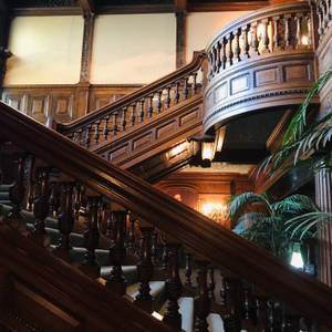 Majestic Stairs Of The James J. Hill House In Minneapolis Wallpaper