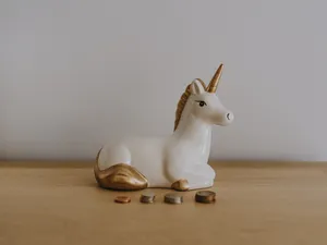 Majestic Unicorn In A Magical Forest Wallpaper