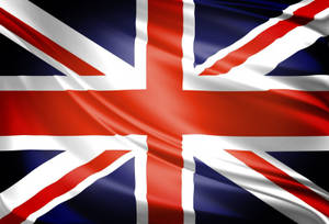 Majestic United Kingdom Flag In A Dark Setting Wallpaper