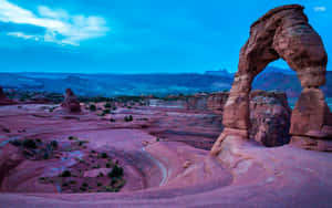 Majestic View Of Delicate Arch At Sunset Wallpaper