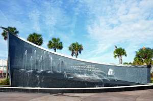 Majestic View Of The Kennedy Space Center With A Sparkling Fountain Wallpaper