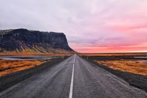 Majestic View Of The Northern Lights Dancing Over Iceland Wallpaper