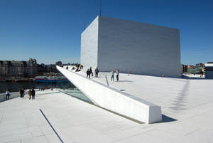 Majestic View Of The Oslo Opera House Against A Clear Sky. Wallpaper