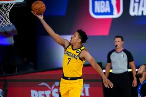 Malcolm Brogdon Lay-up Shot Wallpaper