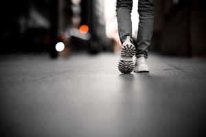 Male Feet Walking In A Gentle Stride Wallpaper