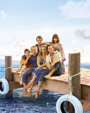 Mama Mia! Cast On Wooden Dock Wallpaper