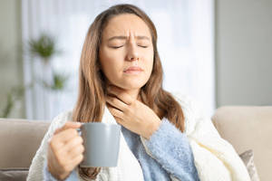 Man Experiencing Tightness And Difficulty In Breathing Wallpaper