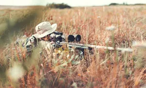 Man Hides While Hunting Desktop Wallpaper